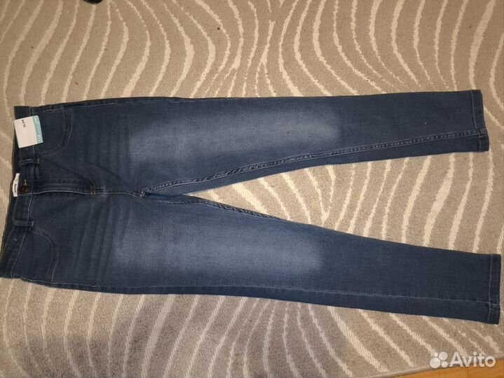 Джинсы новые на девочку 158