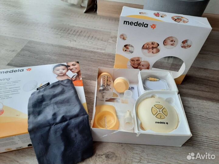 Молокоотсос электрический medela swing