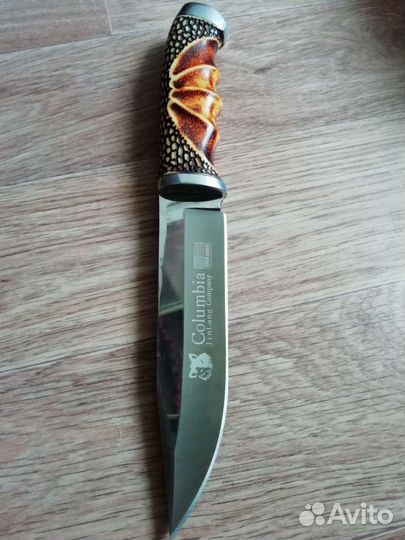 Нож