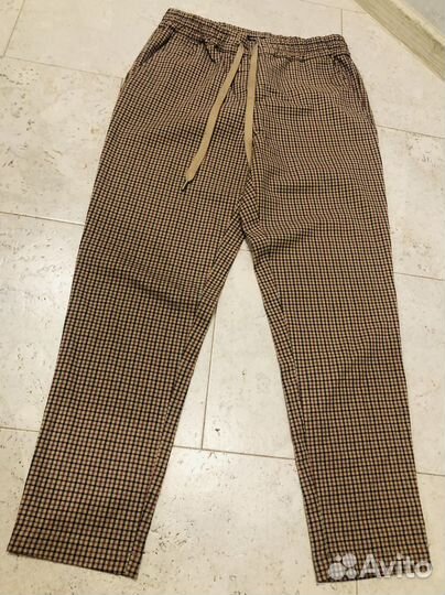 Два больших пакета одежды 42