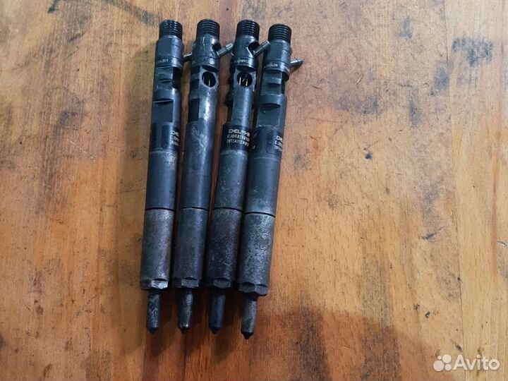 Форсунка 2.9 crdi Kia Carnival J3