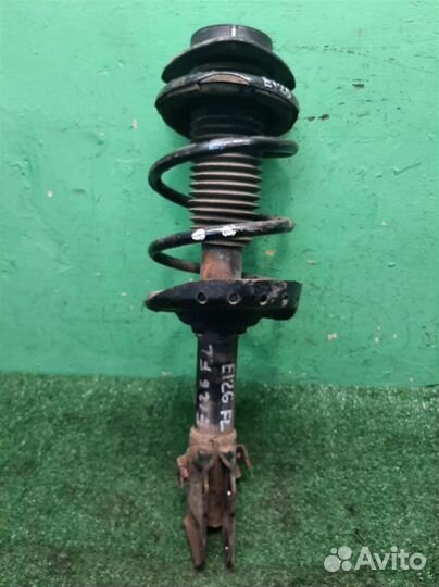 Стойка амортизатора передняя левая Subaru Foreste