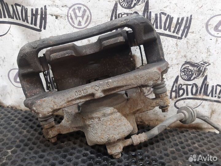 Суппорт передний левый Chevrolet Cruze седан F16D3