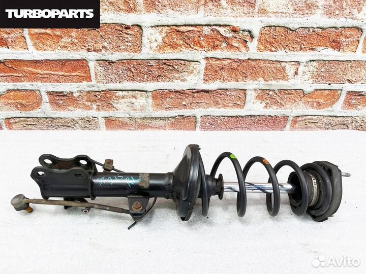 Стойка задняя левая Toyota Caldina ST215W 3sgte