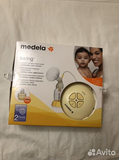Молокоотсос medela swing электрический