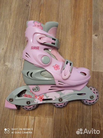 Роликовые коньки