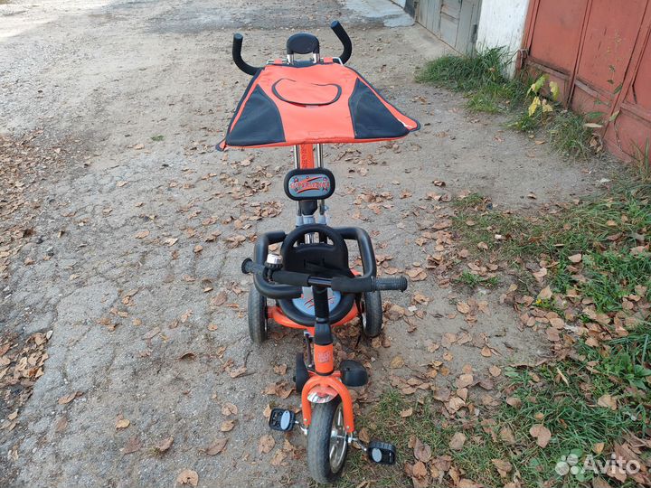 Детский трёхколёсный велосипед с ручкой