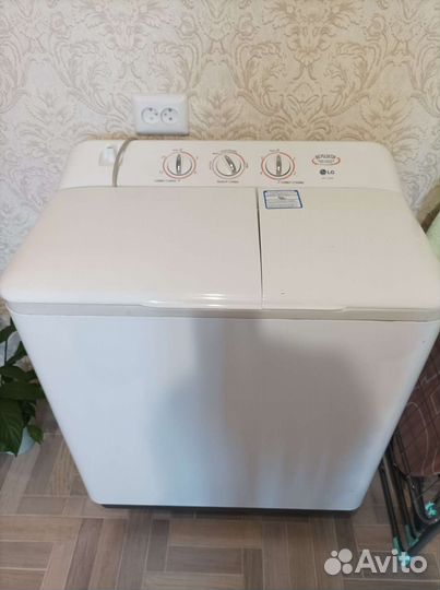 Стиральная машина с вертикальной загрузкой