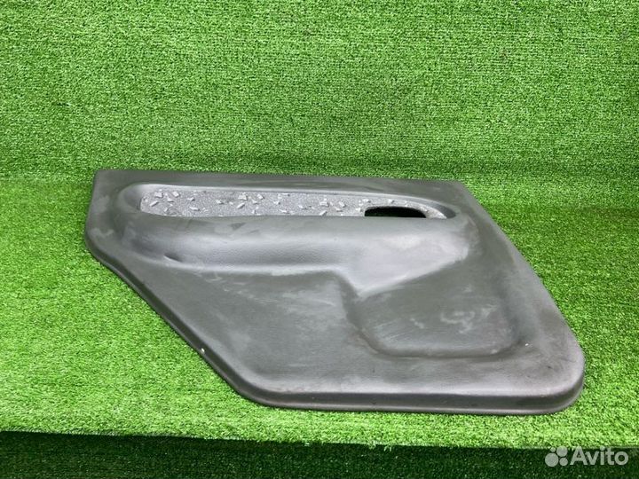 Обшивка двери задняя левая Kia Spectra