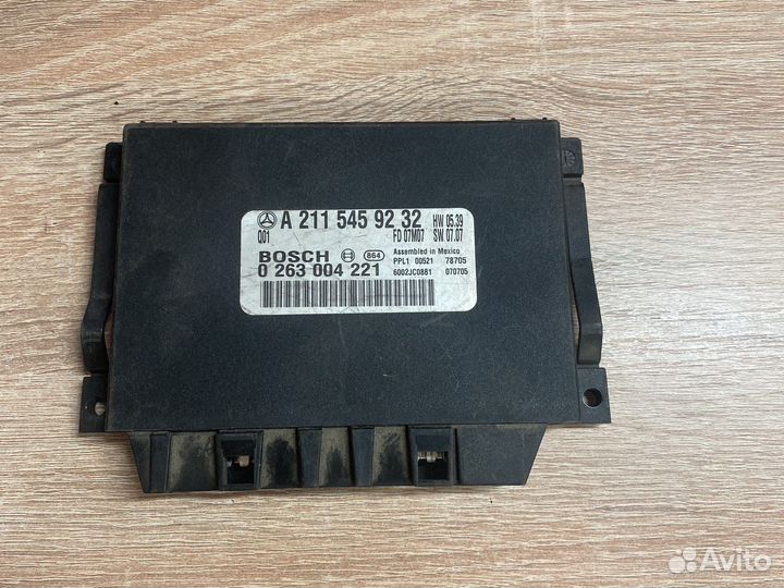 Блок управления парктроником Mercedes 2115459232