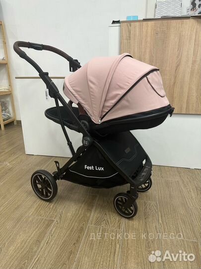 Коляска с перекидной ручкой, реверсивный блок