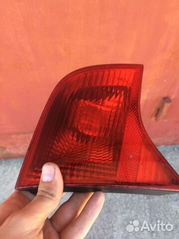 Фонарь в крышку багажника левый Ауди а4 б7 седан