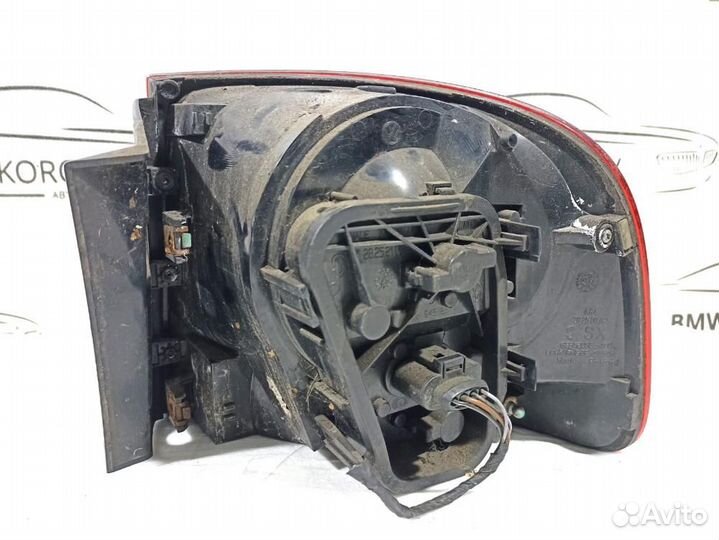 Фонарь задний наружный левый Touareg 2002-2010 (по