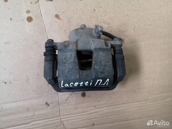 Суппорт передний левый Chevrolet Lacetti