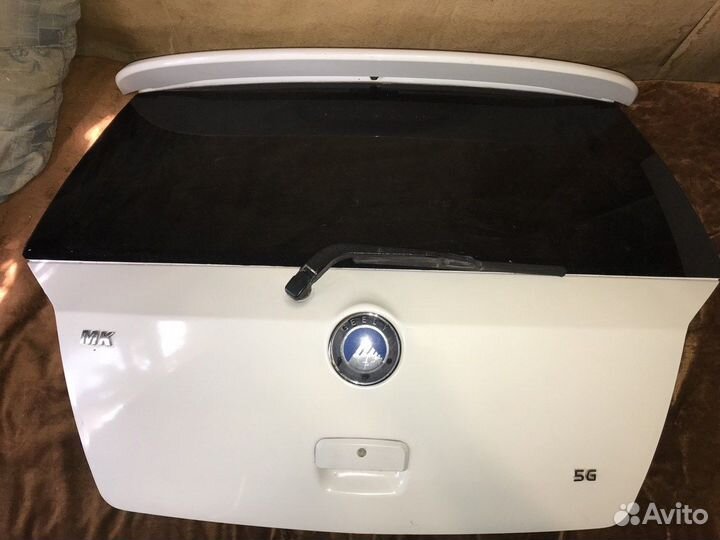 Крышка багажника Geely MK Cross