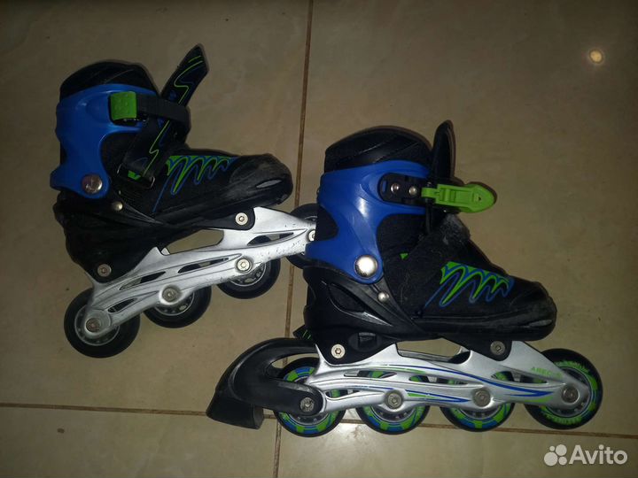 Роликовые коньки