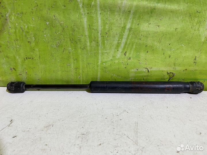 Амортизатор багажника Mitsubishi Lancer 10