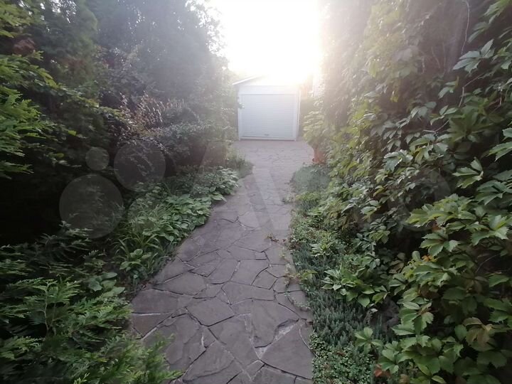 Дом 350 м² на участке 12 сот.