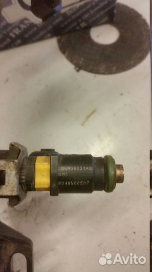 Форсунка инжекторная электрическая VW 036906031AG