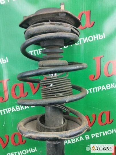 Стойка передняя левая nissan cedric