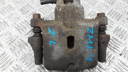 Суппорт тормозной задний левый mitsubishi pajero 3