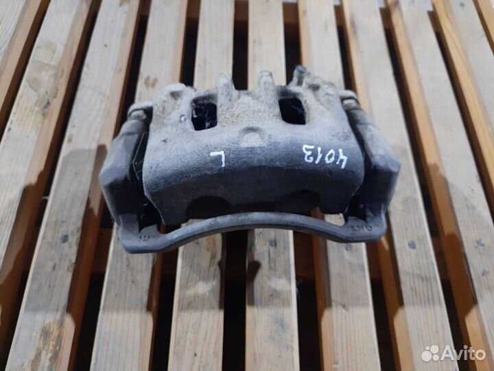 Суппорт тормозной передний левый SsangYong Actyon