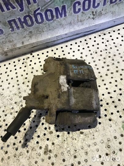 Суппорт тормозной передний правый Renault Symbol