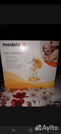 Молокоотсос medela электрический