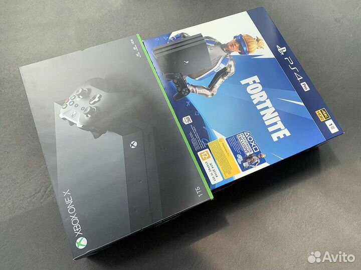 Коробки от XBox One и PlaysStation 4 Pro