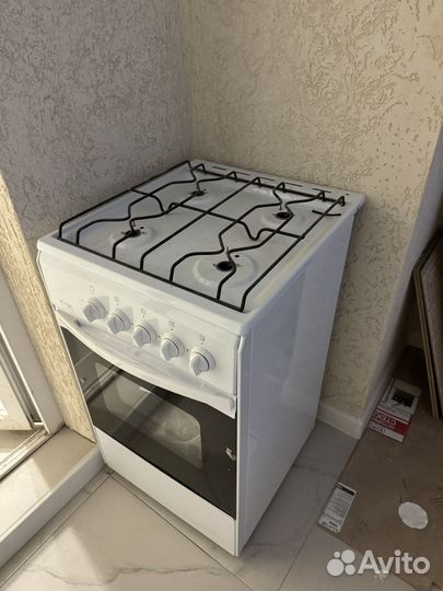 Газовая плита с духовкой