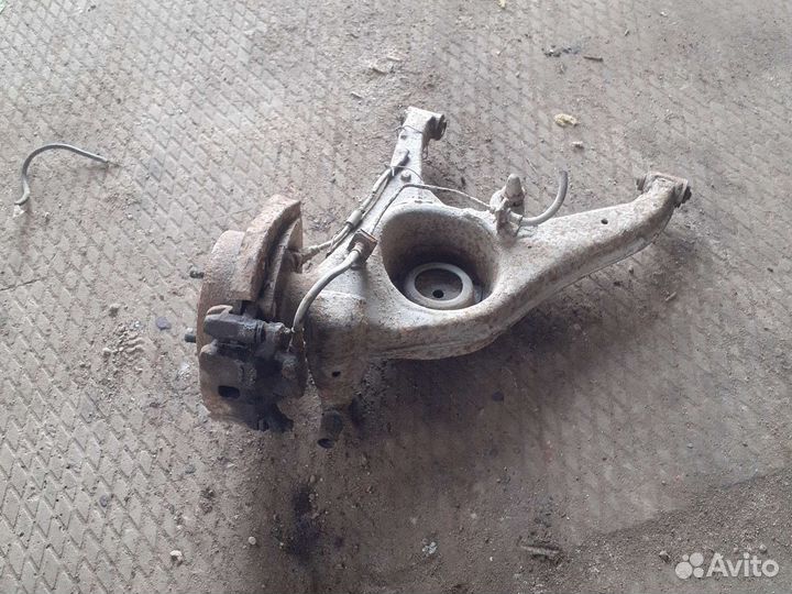 Рычаг задний левый Mitsubishi спайс раннер