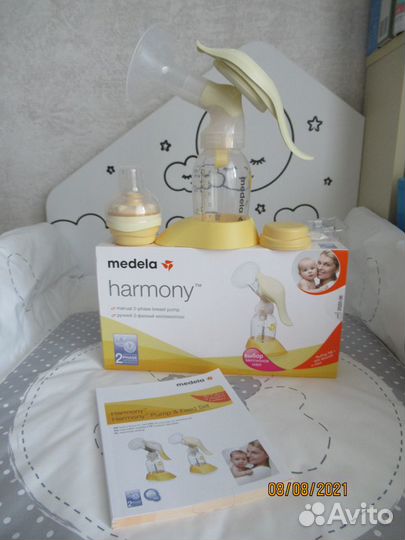 Молокоотсос Medela ручной 2фазный со смартсоской