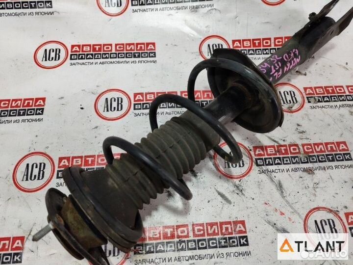 Стойка передняя левая toyota IST