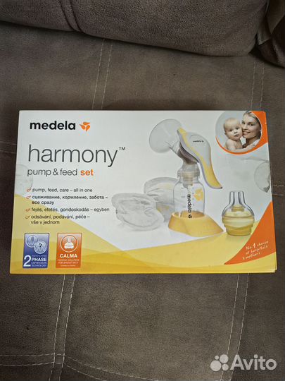 Молокоотсос medela