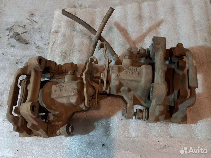 Суппорт задний VW Touran