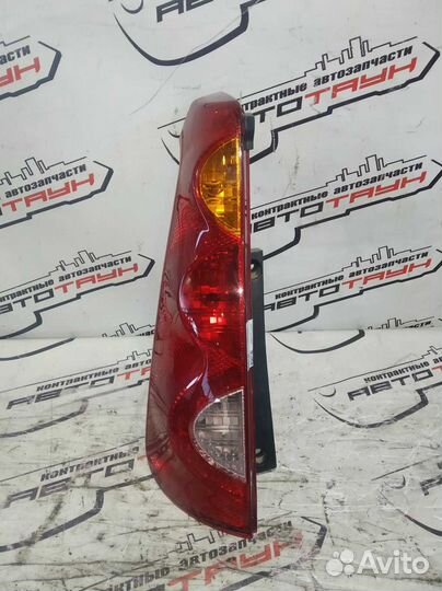 Фонарь nissan note E11 NE11 ZE11 22063780 левый 26