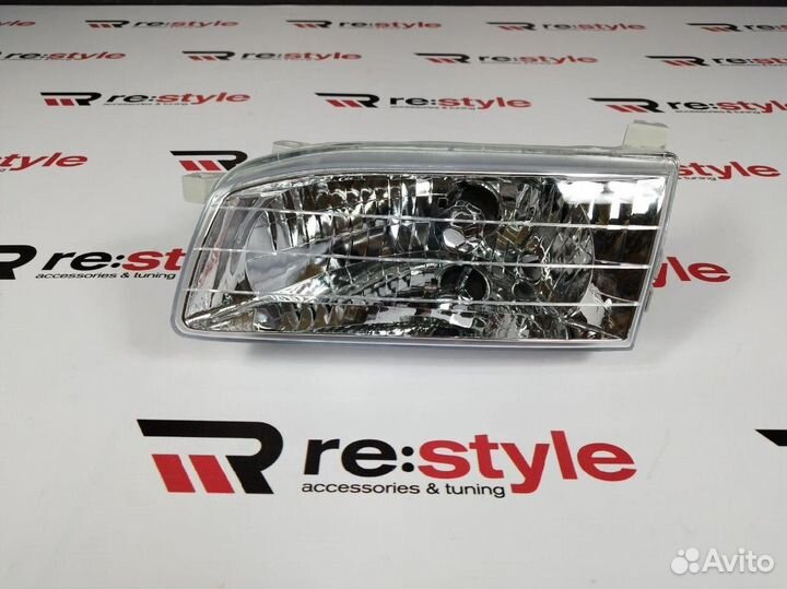 Фара Toyota Sprinter Carib 115 98-00 Левая U2319