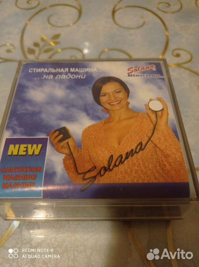 Стиральная машинка на ладони