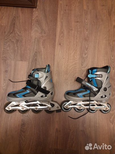 Роликовые коньки