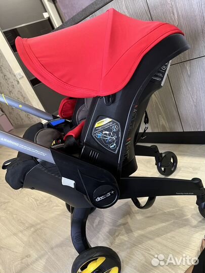 Коляска автокресло doona с базой isofix