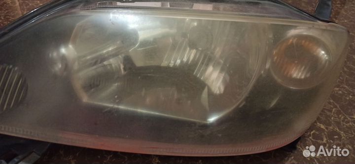 Фара левая мазда демио