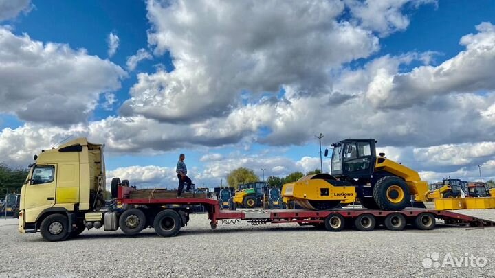 Машинист катка