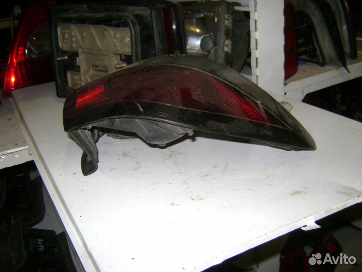 Фонарь внешний левый Мазда 626 гф Mazda 626 GF