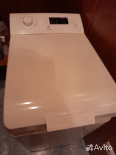 Стиральная машина с вертикальной загрузкой