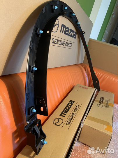 Накладка новая переднего левого крыла Mazda CX-5
