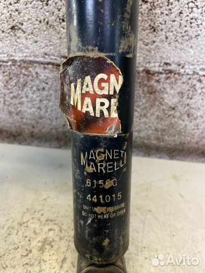 Стойка амортизатора задняя Renault Symbol