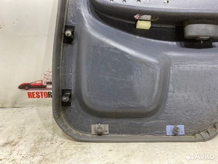 Обшивка боковой двери задняя левая Kia Spectra