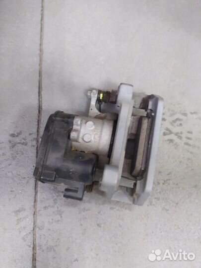 Суппорт тормозной задний правый Tesla Model Y