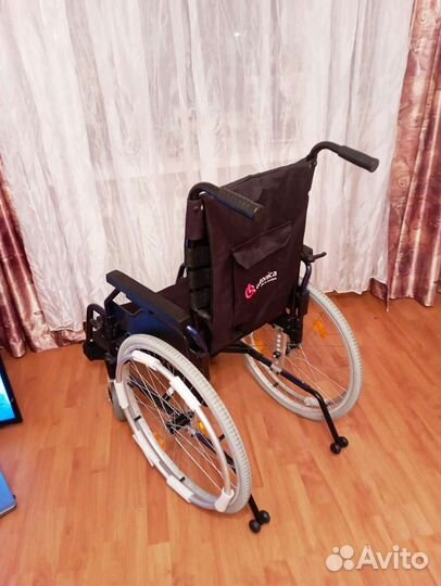 Инвалидная коляска
