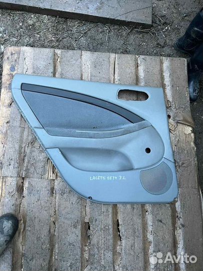Обшивка двери задняя левая Chevrolet Lacetti хечб